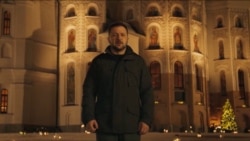 In a screengrab from video, published on his X account Dec. 24, 2023, Ukrainian President Volodymyr Zelenskyy is seen delivering his Christmas address to his nation.