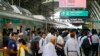 Passengers arrive at a metro train station in Dhaka on August 25, 2024. Bangladesh's metro in the notoriously congested capital Dhaka resumed on Aug. 25, more than a month after it was closed during peak of student-led protests.