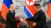 Ruski predsjednik Vladimir Putin i sjevernokorejski Kim Jong Un.