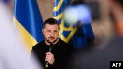 Ukraine's President Volodymyr Zelenskyy speaks with international media in Riga, Latvia, Jan. 11, 2024.