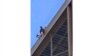 Police arrest man climbing Eiffel Tower hours before Olympic closing ceremony 