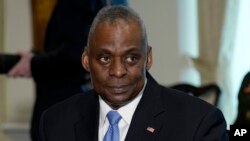 Defense Secretary Lloyd Austin attends a meeting with NATO Secretary General Jens Stoltenberg (not pictured) at the Pentagon, near Washington, Jan. 29, 2024. 