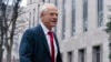 FILE - Former Trump White House official Peter Navarro arrives at U.S. Federal Courthouse in Washington, Jan. 25, 2024.