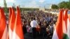 Pemimpin Partai Semua Orang untuk Hungaria, Peter Marki-Zay, berpidato dalam demo menentang aturan pajak baru dari Perdana Menteri Orban di Budapest, Hungaria, Sabtu, 16 Juli 2022. (Foto: Ferenc Isza/AFP)