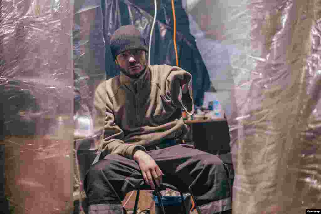 This photo of a wounded soldier taken inside Azovstal was released to the press on May 10, 2022, as the defenders called on the Ukrainian government and the international community to not only hail the defenders of Mariupol as heroes but &quot;do something&quot; to protect the soldiers, their wounded and their fallen comrades.
