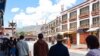 FILE - People line up for COVID-19 tests in Lhasa, in China's western Tibet Autonomous Region, Aug. 9, 2022.