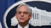FILE - Attorney General Merrick Garland speaks at the Justice Department, Aug. 11, 2022, in Washington.