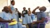FILE - Malawian journalist Kenneth Jali takes the cholera vaccine during the launch of the vaccination campaign in Blantyre, May 23, 2022. (Lameck Masina/VOA)