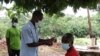 A villager in Southern Malawi readying for a COVID-19 jab. (Lameck Masina/VOA)