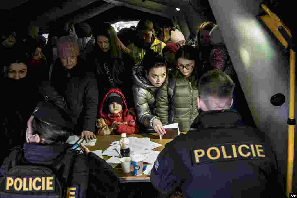 Ukrainian refugees queue to file for residency permits at Prague&#39;s foreigner police headquarters, March 2, 2022 in Prague, Czech Republic.