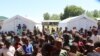 FILE - Children gather at a camp in the Phalombe district, Malawi, Feb. 3, 2022. Health experts say the COVID-19 pandemic has deprived many children of the chance to complete all doses of the polio vaccine. (Lameck Masina/VOA)
