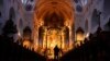 A man walks through the St. Anna basilica in Altoetting, some 90 kilometers east of Munich near Marktl, the birthplace of Pope emeritus Benedict XVI, Germany, Dec. 29, 2022. 