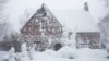 A winter storm rolls through western New York, Dec. 24, 2022, in Amherst, NY. 