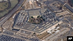 FILE - The Pentagon is seen from Air Force One as it flies over Washington, March 2, 2022. A new Pentagon office set up to track reports of unidentified flying objects has received “several hundreds” of new reports, but no evidence so far of alien life. 