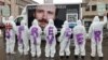 Protesters wear clothes reading 'Free Olivier' during a solidarity demonstration calling for the release from Iranian custody of Belgian aid worker Olivier Vandecasteele, in Brussels, Belgium, Dec. 25, 2022. 