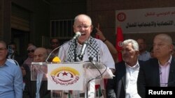 Noureddine Taboubi, secrétaire général de l'Union générale tunisienne du travail (UGTT), s'exprime lors d'une grève nationale publique à Tunis, le 16 juin 2022.