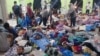Rohingya Refugees Adrift for Weeks at Sea Land in Indonesia 