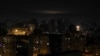 A fireball from an explosion is seen above Kyiv's skyline during Russian drone strikes, on Ukraine's capital, Jan. 1, 2023. 