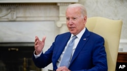 FILE - President Joe Biden speaks in the Oval Office of the White House, May 31, 2022, in Washington. Biden said Tuesday he decided to provide Ukraine with “more advanced rocket systems and munitions” as part of U.S. efforts to help the Ukrainian fight ag