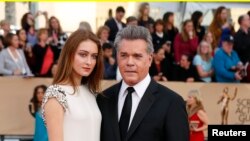 File - Actor Ray Liotta and a guest arrive at the 22nd Screen Actors Guild Awards in Los Angeles, California January 30, 2016.