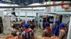 Petugas gabungan saat melakukan pemeriksaan di kapal penangkap ikan China, Lu Huang Yuan Yu 118, di Kepulauan Riau, Rabu 8 Juli 2020. (Courtesy: Polda Kepri)