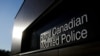 Logo dari kepolisian Royal Canadian Mounted Police (RCMP) terlihat pada markas kepolisian tersebut yang terletak di Surrey, British Columbia, dalam foto yang diambil pada 5 Desember 2017. (Foto: Reuters/Ben Nelms)