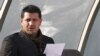 Protest-Backing Soccer Star's Family Kept from Leaving Iran 