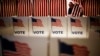 Voters cast their votes during the U.S. presidential election in Medina, Ohio, U.S. Nov. 8, 2016. 