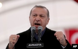 Turkey's President Recep Tayyip Erdogan speaks during the opening ceremony of the Eurasia Tunnel in Istanbul, Dec, 20, 2016.