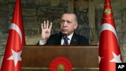 Turkey's President Recep Tayyip Erdogan speaks during a meeting, in Istanbul, Jan. 15, 2021.