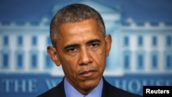 FILE - U.S. President Barack Obama delivers remarks at the White House.