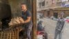 Through the Lens: One Year on, Russia's War in Ukraine Hits Egypt's Poor