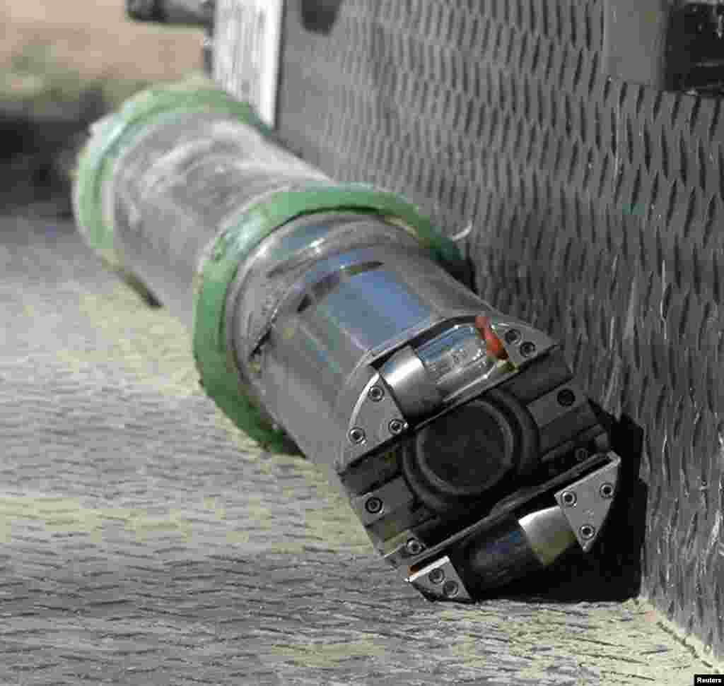 A high resolution dual lens camera system sits on the back bumper of a truck waiting to be lowered into an 1,868-foot shaft as part of the rescue effort at the Crandall Canyon Mine in Huntington, Utah for six trapped miners, Aug. 11, 2007. (Reuters)