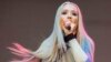 Amethyst Amelia Kelly, also known as Iggy Azalea, performs during Music Midtown 2014 at Piedmont Park in Atlanta, Sept. 19, 2014.