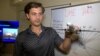 Flight instructor Gonzalo Zulueta displays a miniature Boeing 777-300ER commercial aircraft in Miami, Florida, March 4, 2025. (Photo: Antoni Belchi/VOA)