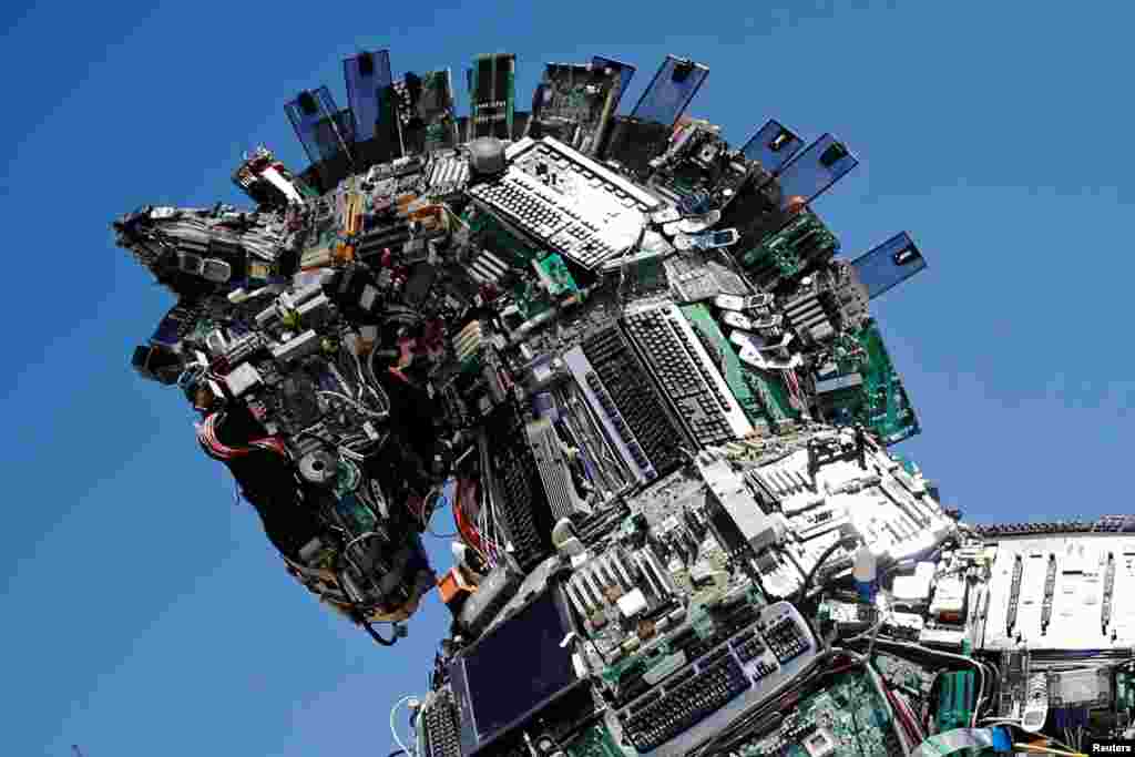 A "Cyber Horse" - made from thousands of infected computer and cell phone bits - is on display at the entrance to the annual Cyberweek conference at Tel Aviv University, Israel.