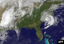 Satellite images help researchers note green spaces around schools. They also help to track storms like this one hitting the southeastern coast of the U.S. in May 2015. (AFP PHOTO)
