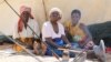Some of people displaced by Tropical Storm Ana are seen at Bangula Evacuation Camp in Nsanje district. (Lameck Masina/VOA)