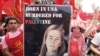 Lebanese anti-American protesters display a poster of peace activist Rachel Corrie during a demonstration near the U.S. Embassy in Aukar northeast of Beirut, Lebanon, June 6, 2010.