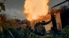 Ukrainian soldiers fire in the recently retaken Kupiansk in the Kharkiv region, Ukraine, Sept. 23, 2022. 