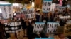 Protesters attend a rally against Japan's state funeral for former Prime Minister Shinzo Abe that will be held next Tuesday in Tokyo, Japan, Sept. 25, 2022. 