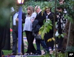 Actor-director Penny Marshall, second from left, leaves a memorial service at the homes of Debbie Reynolds and her daughter, Carrie Fisher, in Los Angeles, Jan. 5, 2017.