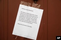 A message from Jim and Lyn Coleman is posted on their home in Stewartstown, Pa., Oct. 12, 2017. The Coleman's daughter Caitlan Coleman, her Canadian husband and their three young children have been released after years held captive by a group that has ties to the Taliban.