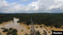 A bridge damaged by floods in Chai Buri District, Surat Thani province, southern Thailand, Jan. 9, 2017.