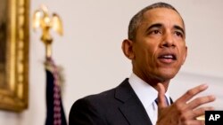 FILE - President Barack Obama speaks about the release of Americans by Iran, Jan. 17, 2016, in the Cabinet Room of the White House in Washington.