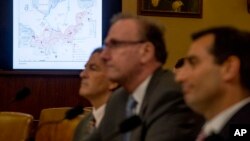 A map of the Arctic Ocean is displayed as officials from the Office of National Intelligence and the Pentagon apppear before a House Intelligence Committee hearing on national security implications of climate change on Capitol Hill in Washington, June 5,