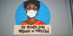 This image created by graffiti collective RBS highlights the need to wear face masks as the coronavirus continues to spread. (Alpha Sy)