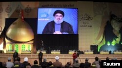 Pemimpin Hizbullah Lebanon, Sayyed Hassan Nasrallah menyampaikan sambutan dalam peringatan hari Martir di daerah sub-urban Beirut, Lebanon, 11 November 2015 (Foto: dok). 
