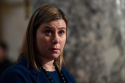 Rep. Elissa Slotkin, D-Mich., does a television interview on Capitol Hill in Washington, Dec. 18, 2019.