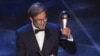 Juergen Klopp avec son trophée de meilleur entraîneur de l'année, Italie, le 23 septembre 2019.